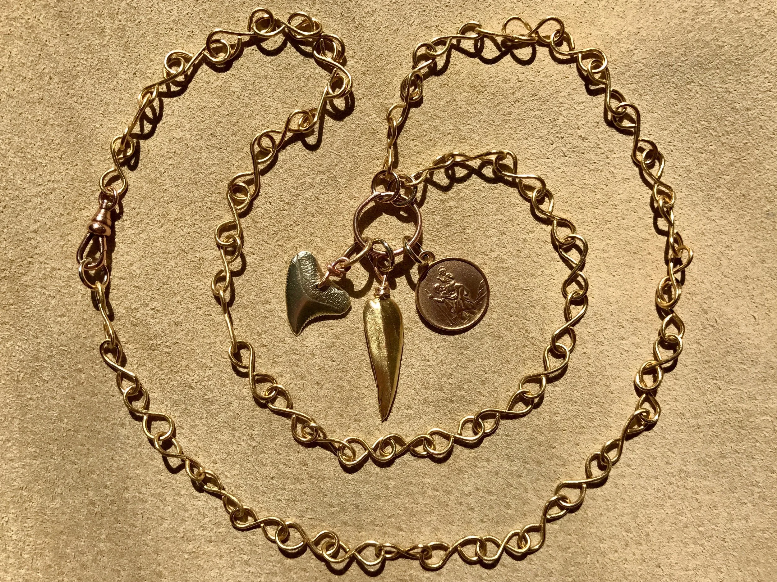 INFINITY CHAIN NECKLACE WITH SHARKS TOOTH, MISSISSIPPI CAST PENDANT AND ST. CHRISTOPHER MEDALLION