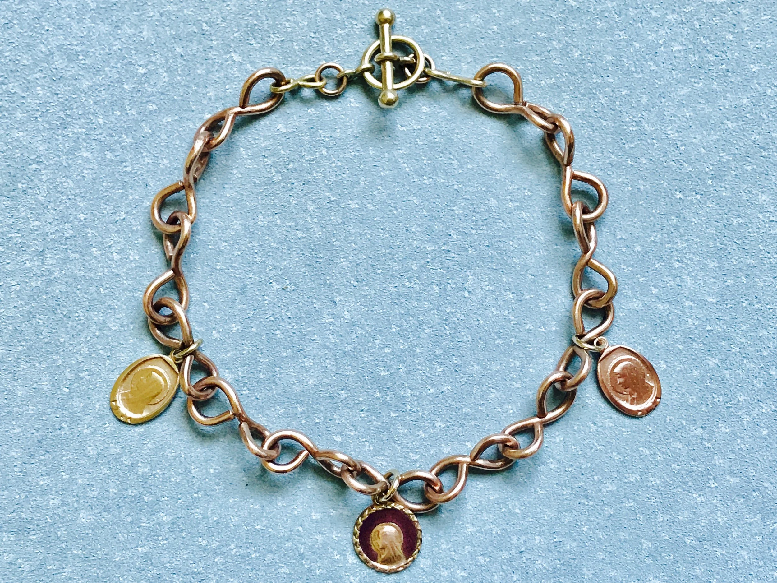 TWISTED INFINITY CHAIN BRACELET WITH MADONNA MEDALLIONS