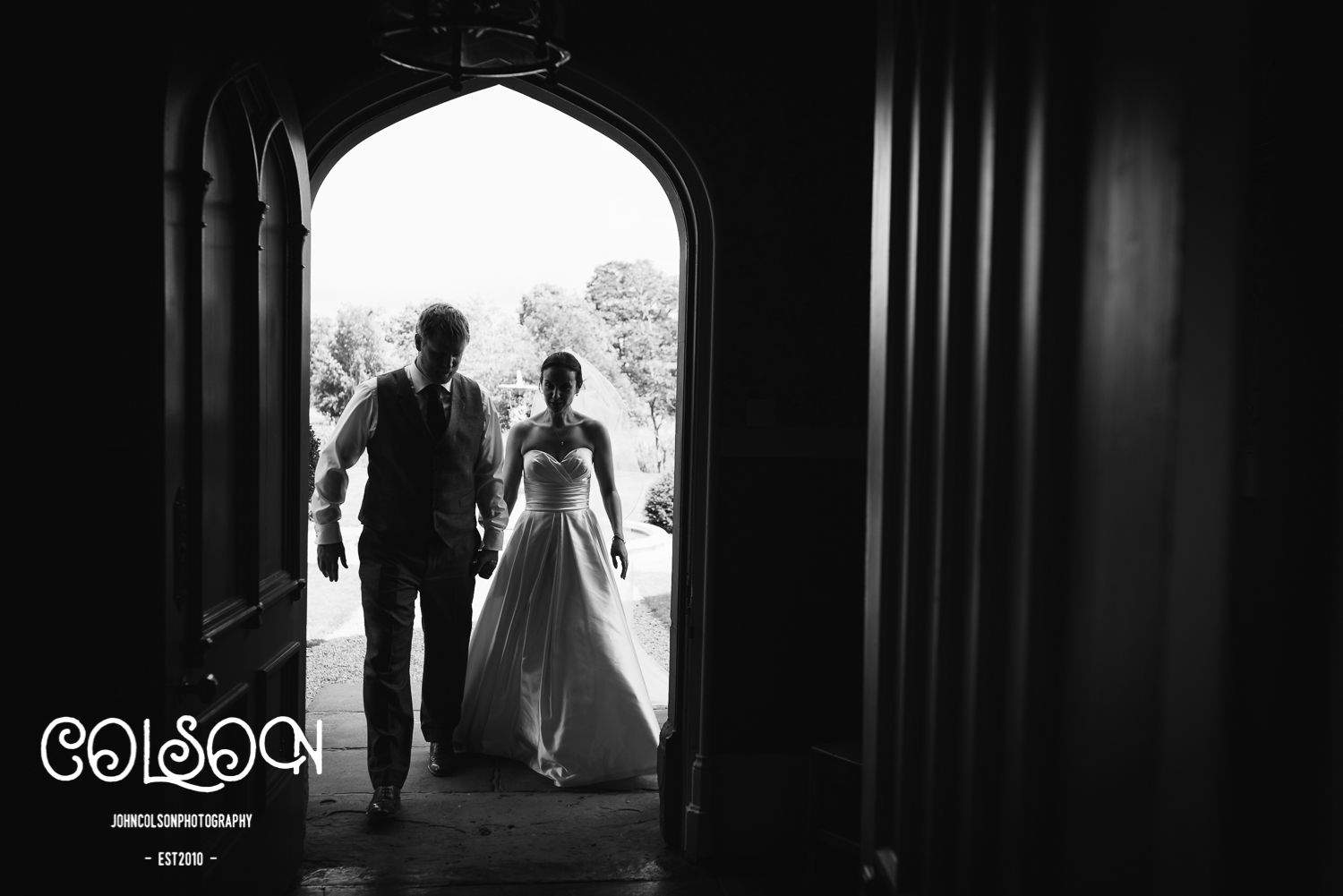 The Bride and Groom making their way to their wedding breakfast at Lemore Manor.