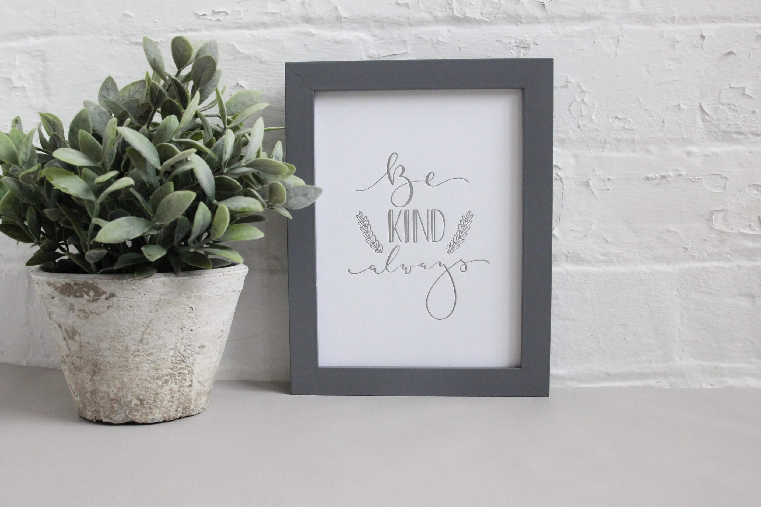 Home and giftware letter pressed wall art with hand illustrated calligraphy