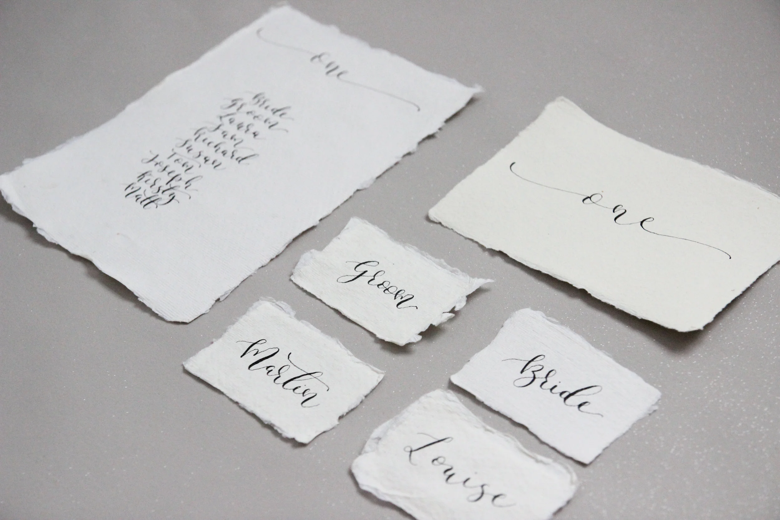 modern calligraphy wedding stationery, menu, table numbers and place name settings