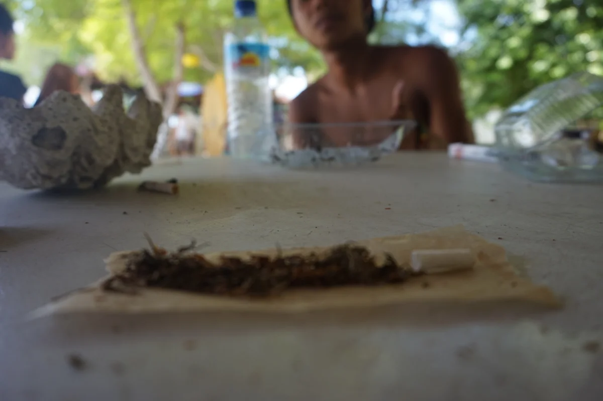 Westerners go to the island and act like kings, Kiki says. 