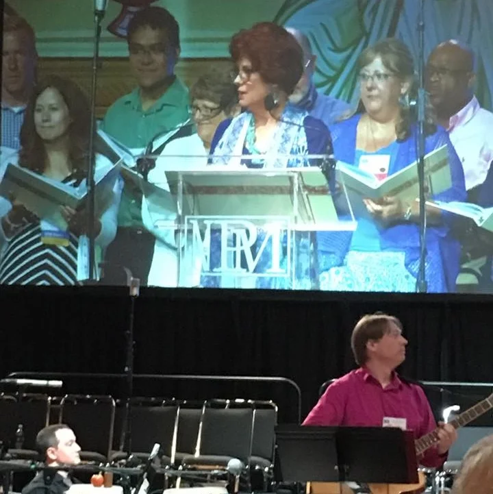 Members singing and playing at WLP Showcase