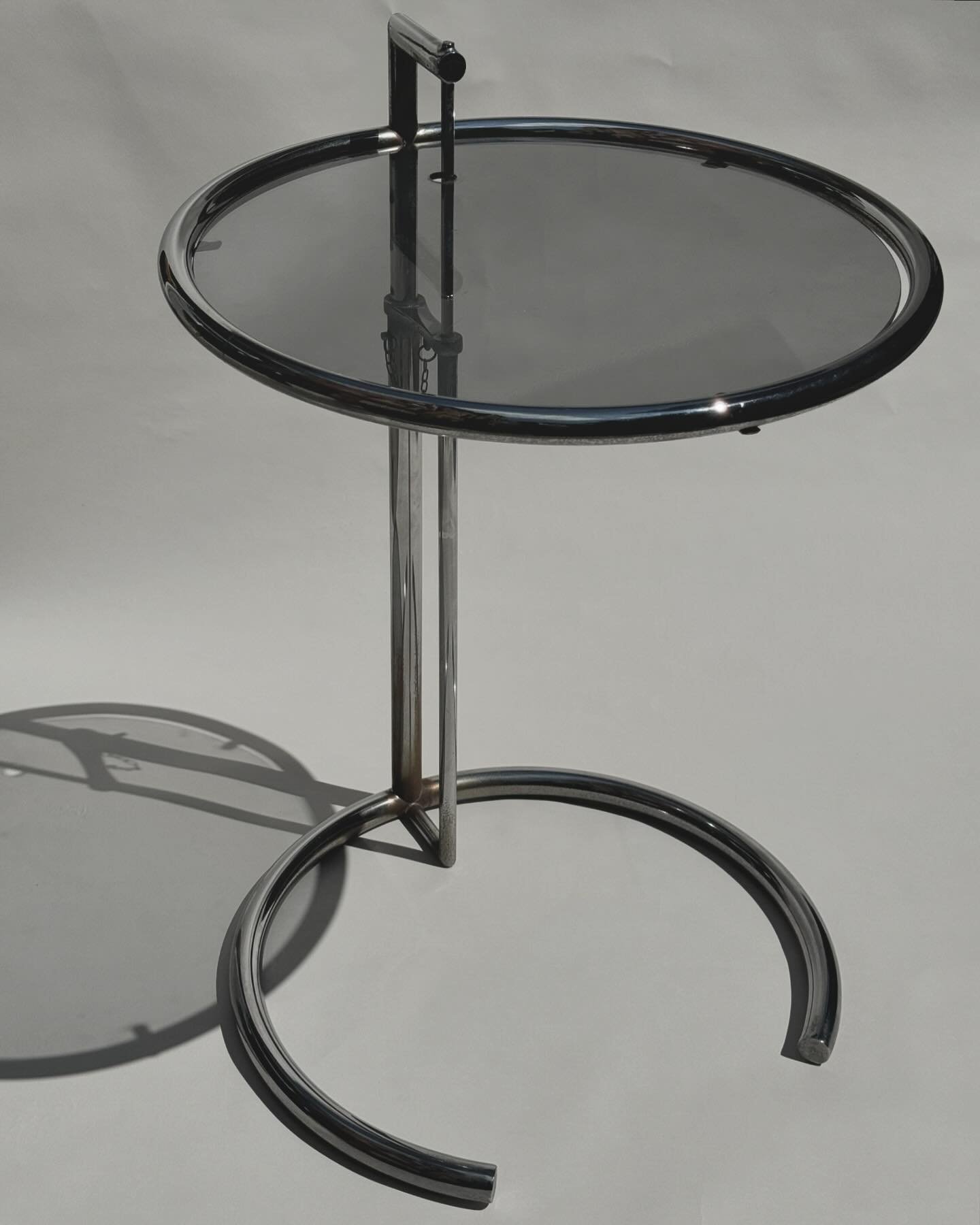 Model #E1027 &bull; Adjustable Chrome &amp; Glass Table &bull; by Eileen Gray &bull; 1970&rsquo;s Production &bull; $795
&bull;
&bull;
&bull;
&bull;
&bull;
#eileengray #1970s #design #interiordesign #architect #architectural #sidetable #table #chrome