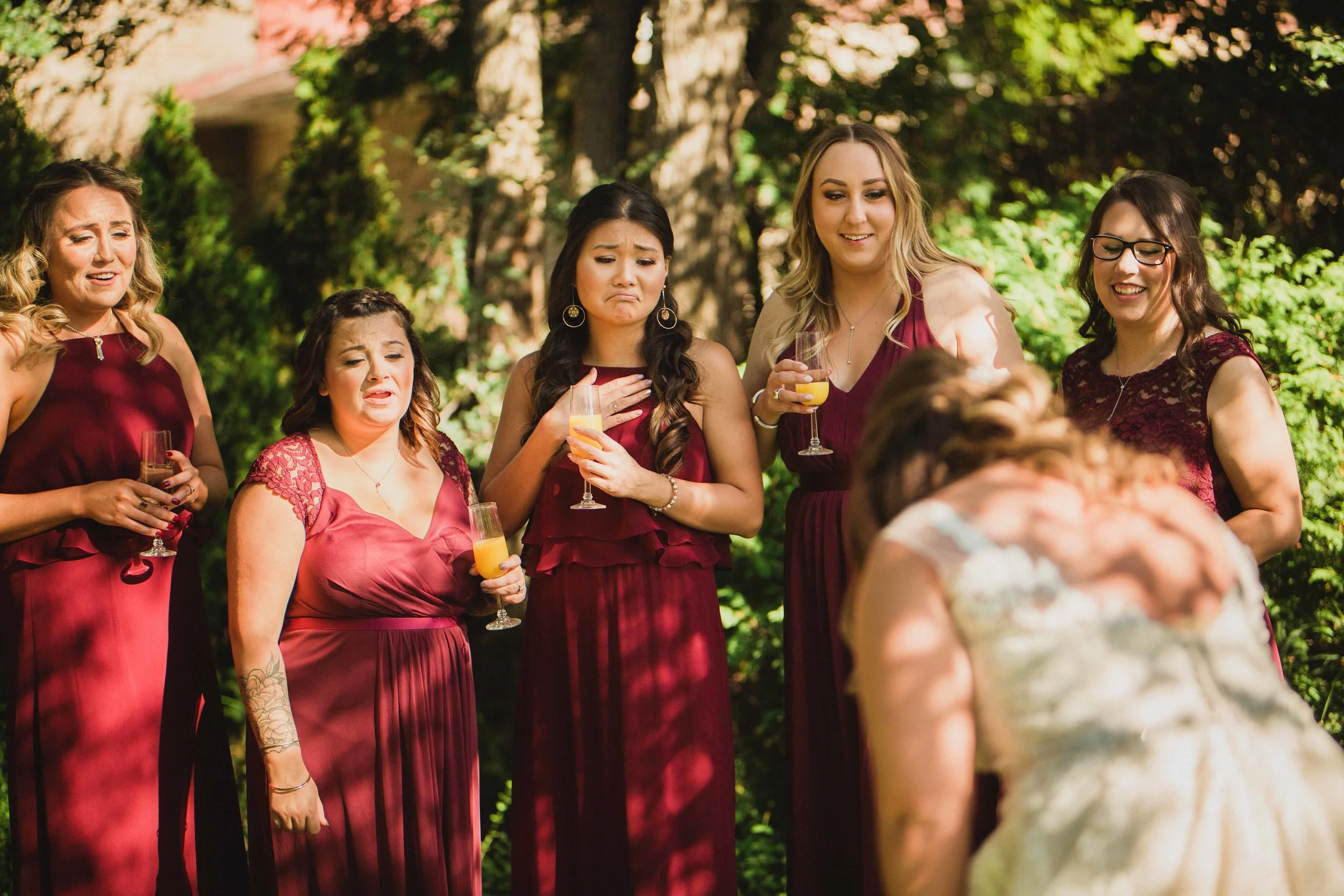 An absolutely touching “first look” with the bridesmaids