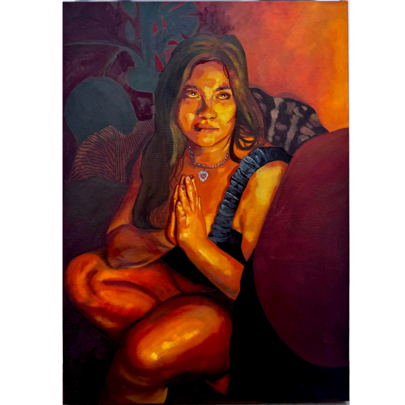 Laura. Teresa De Cata. 2025. Oil on canvas, 50 × 70 cm. Seated woman with her hands together in a colourful interior.