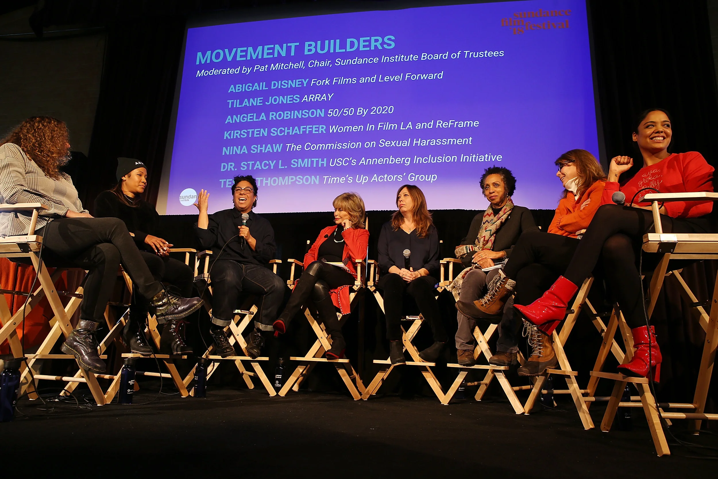 (L-R) Abigail Disney, Tilane Jones, Angela Robinson, Pat Mitchell, Kirsten Schaffer, Nina Shaw, Dr. Stacy L. Smith, and Tessa Thompson speak onstage at The Sundance Institute, Refinery29 and DOVE Chocolate Present 2018 Women at Sundance Brunch on January 22, 2018 in Park City, Utah. (Photo by Phillip Faraone/Getty Images for Refinery29)