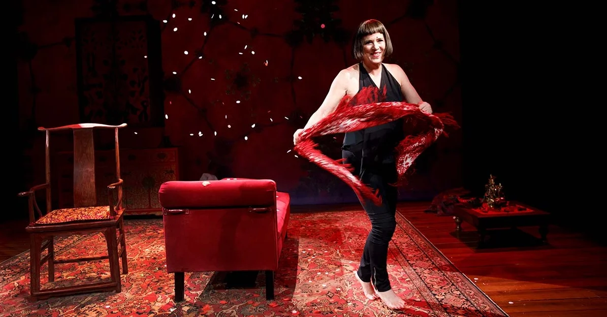 Eve Ensler performing in her one-woman play, "In the Body of the World." (Photo by Joan Marcus)