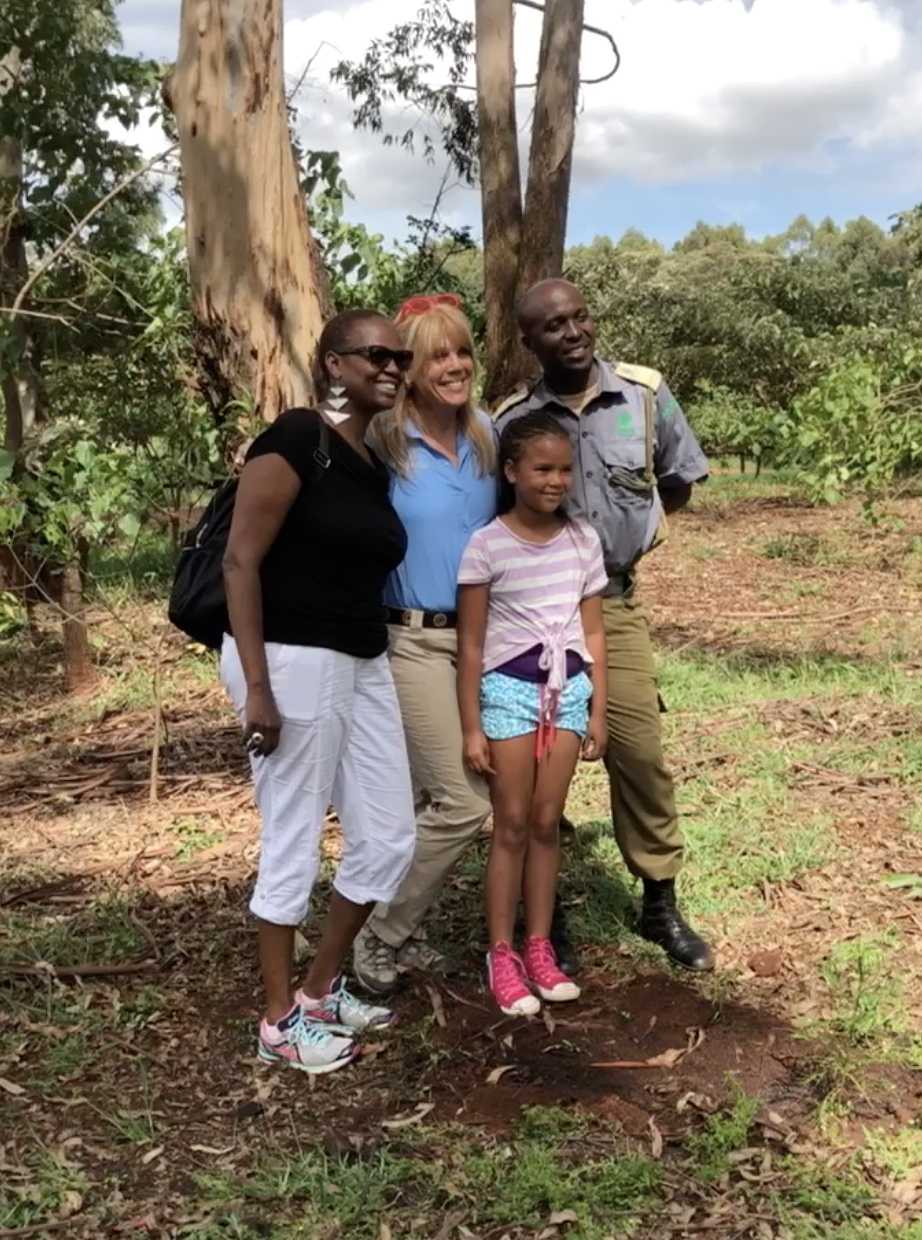 Wanjira Mathaai, daughter of Nobel Peace Prize Wangari Mathaai, her daughter and husband with Laura Turner Seydel in the People's Park where her mother planted one million trees. We added a few!