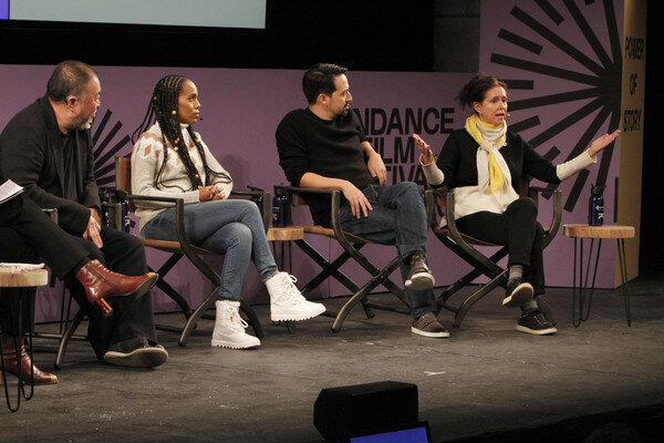  (L-R) Ai Weiwei, Kerry Washington, Lin-Manuel Miranda and Julie Taymor speak on stage at the Power Of Story: Just Art Panel (Credit: JeremyChanPhotography.com/Getty Images North America) 