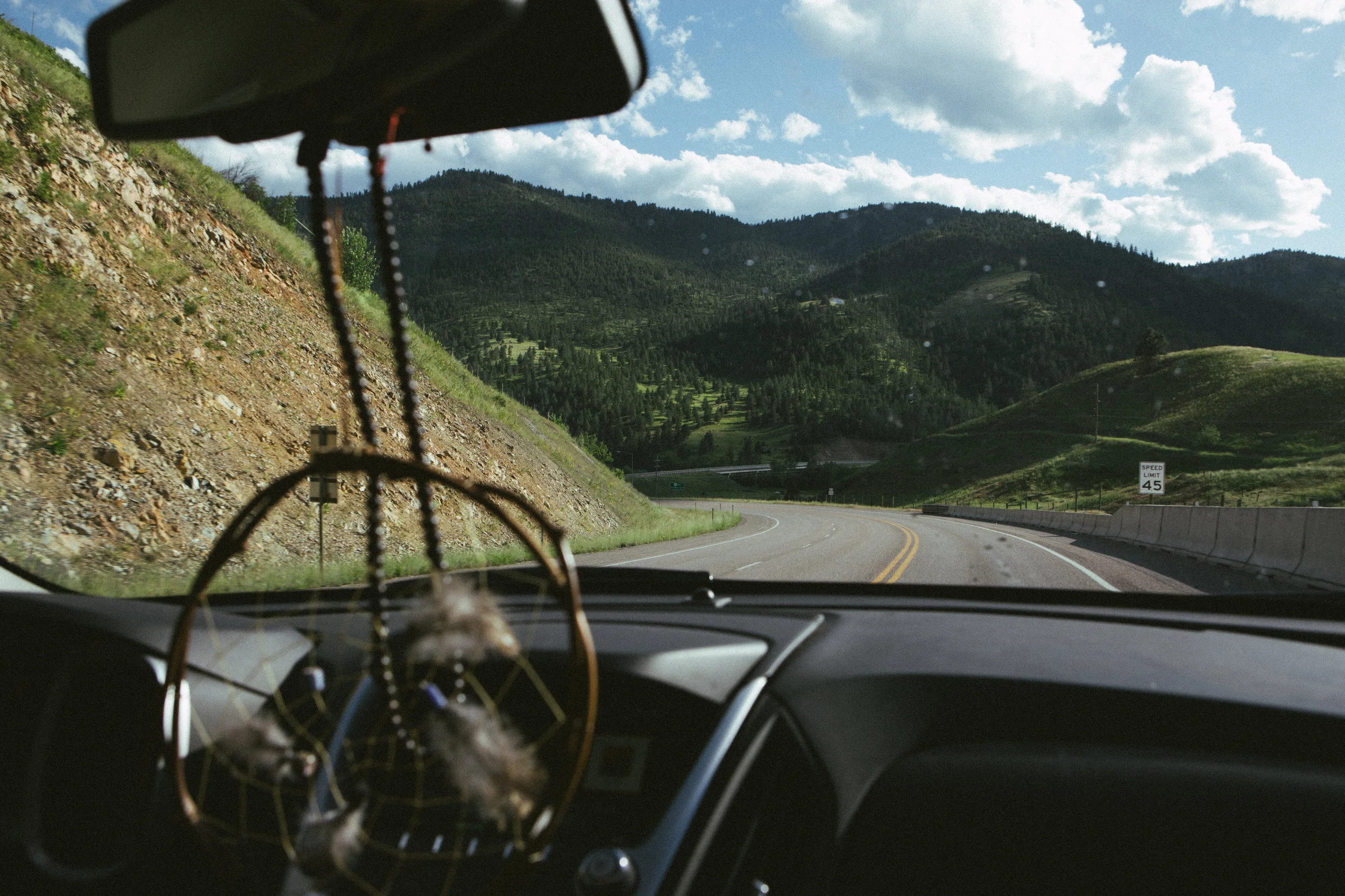 On a trip through Montana with Ben and my friend Allister we hung dream catchers and beads on the rearview mirror and added little things we collected along the road. 