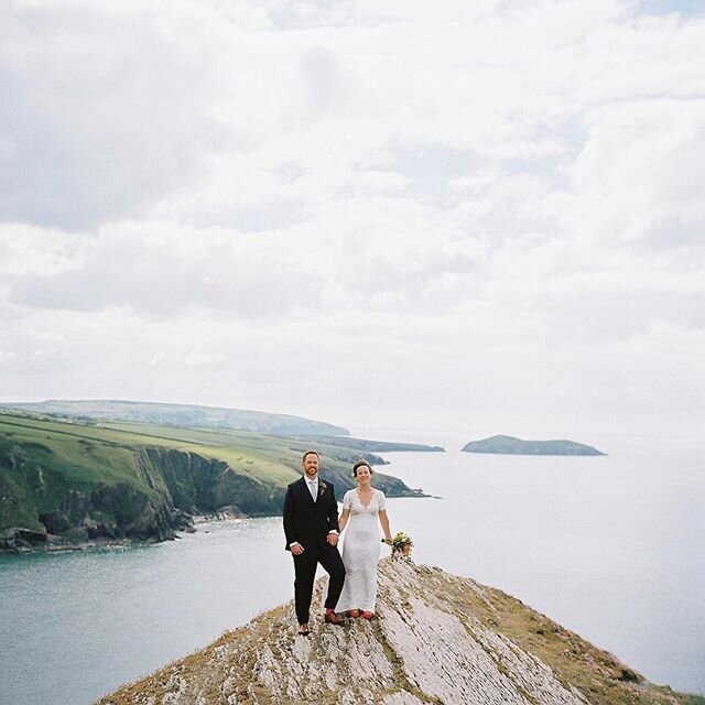 When Bethan &amp; Andy walked to the top of Mwnt and Bethan wore her red and gold shoes. .
Beautiful day and beautiful photos by @jimmarsdenphotography .
.
.
#fforestwedding #mwnt #welshwedding #thewildbride #rockmywedding #wildwedding #cocoweddingve