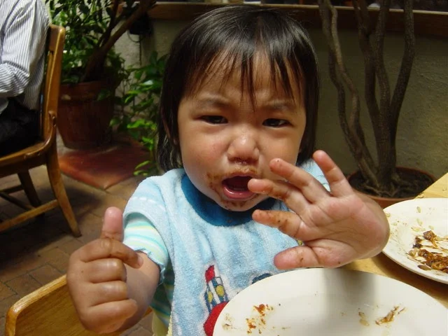 My daughter, choosing NOT have her energy sucked by a photograph.