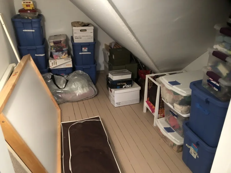 The storage room in our attic. Many of those boxes are going to go!
