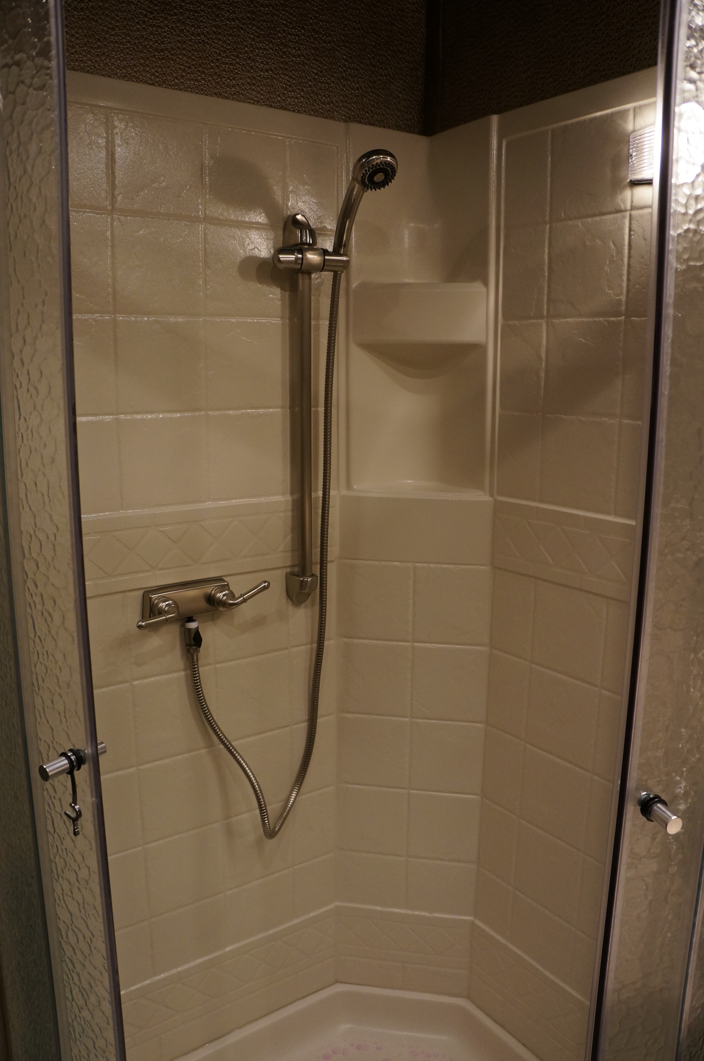 Almond Shower with Silver Faucet  & Shower Head on Slider Bar