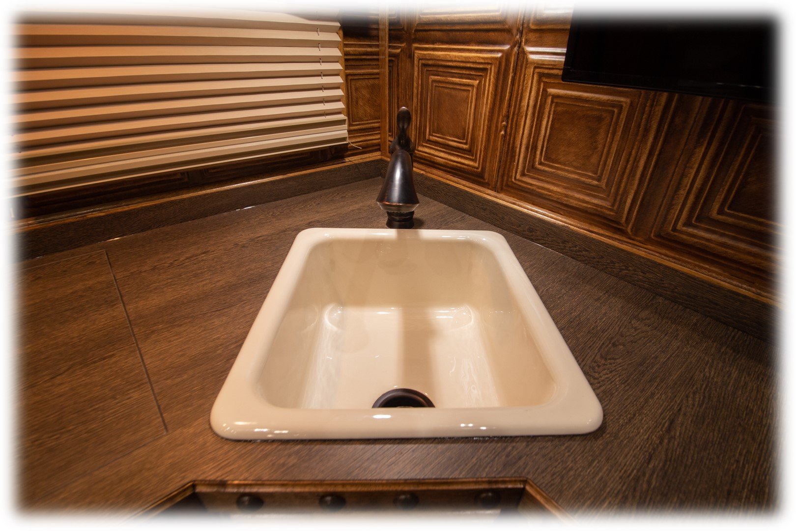 Deep porcelain Sink with Bronze Pull Out Faucet