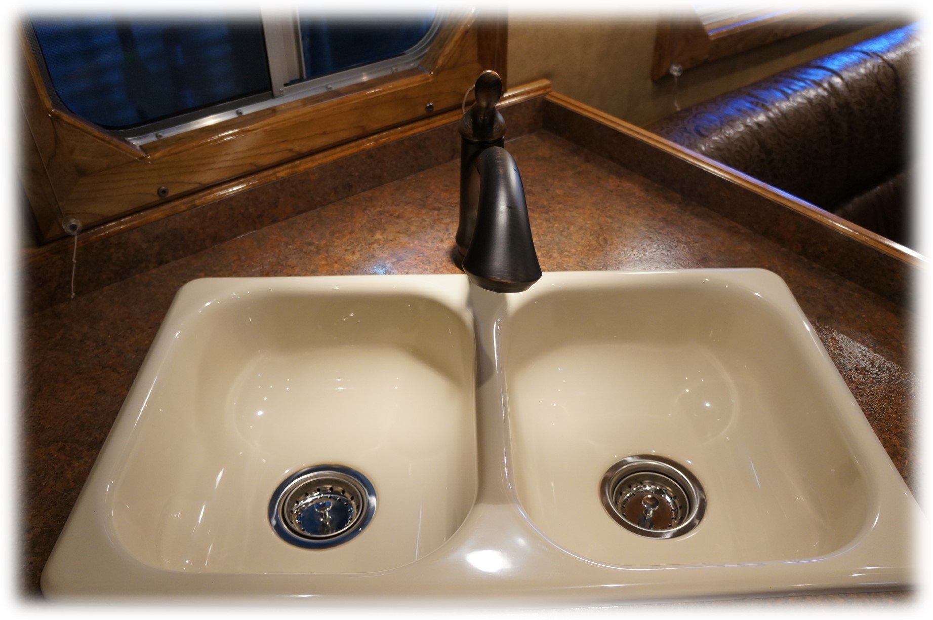 Double Sink with Bronze Pull Out Faucet