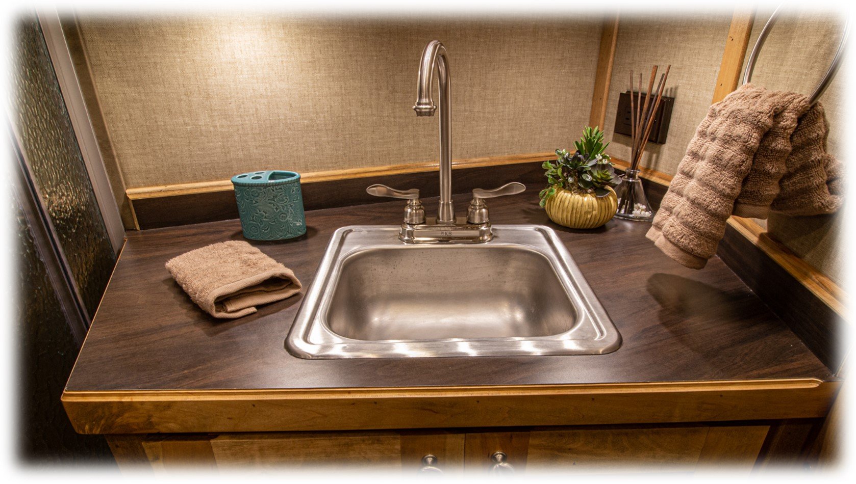 Standard Stainless Sink with Standard Silver Bar Faucet