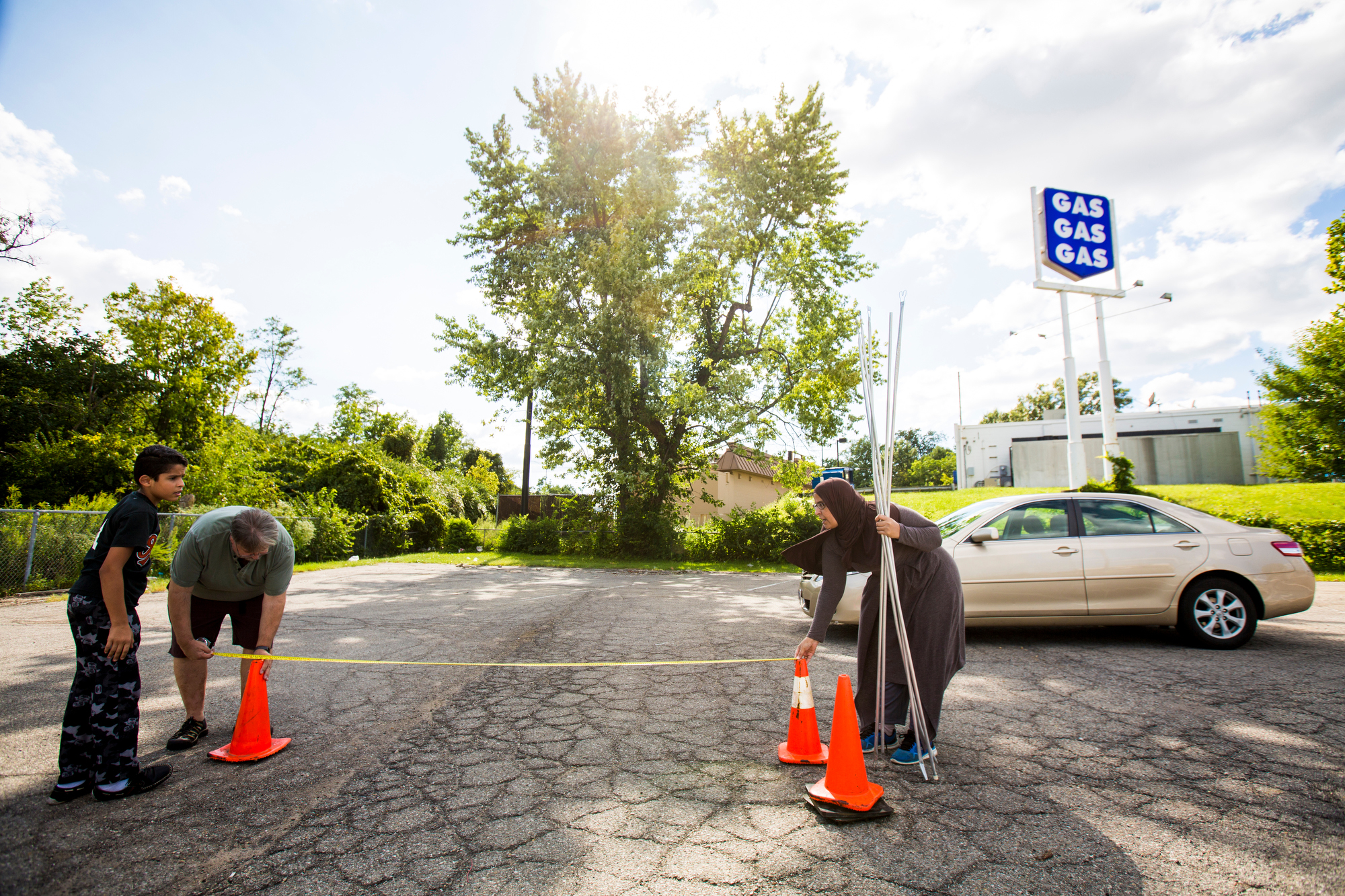  John Szucik, a volunteer at Immaculate Heart of Mary, instructs Ahlam Alhamoud as she practices driving on Friday, September 2, 2016. Ahlam wants to drive to be independent. She wants to go grocery shopping and to her English classes on her own. 