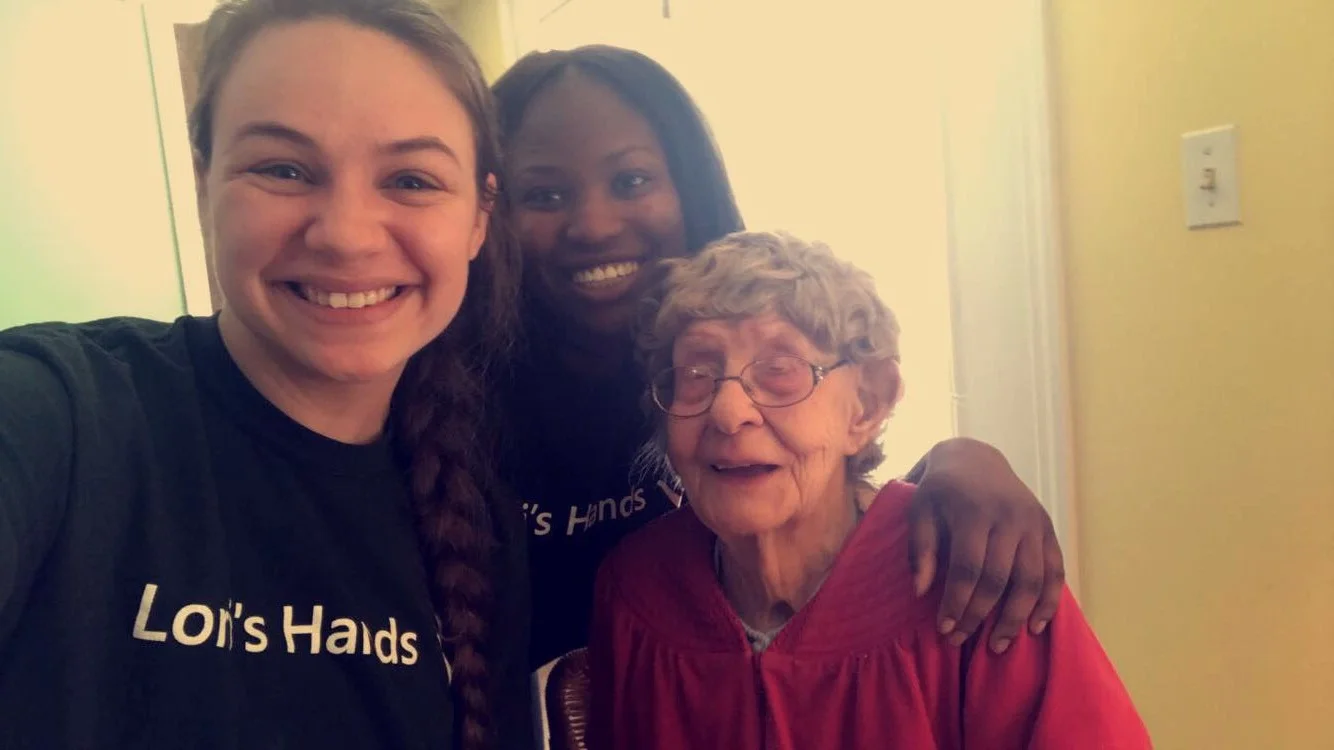 Marina and Chelsea take a moment during a visit to snap a selfie with a client. 