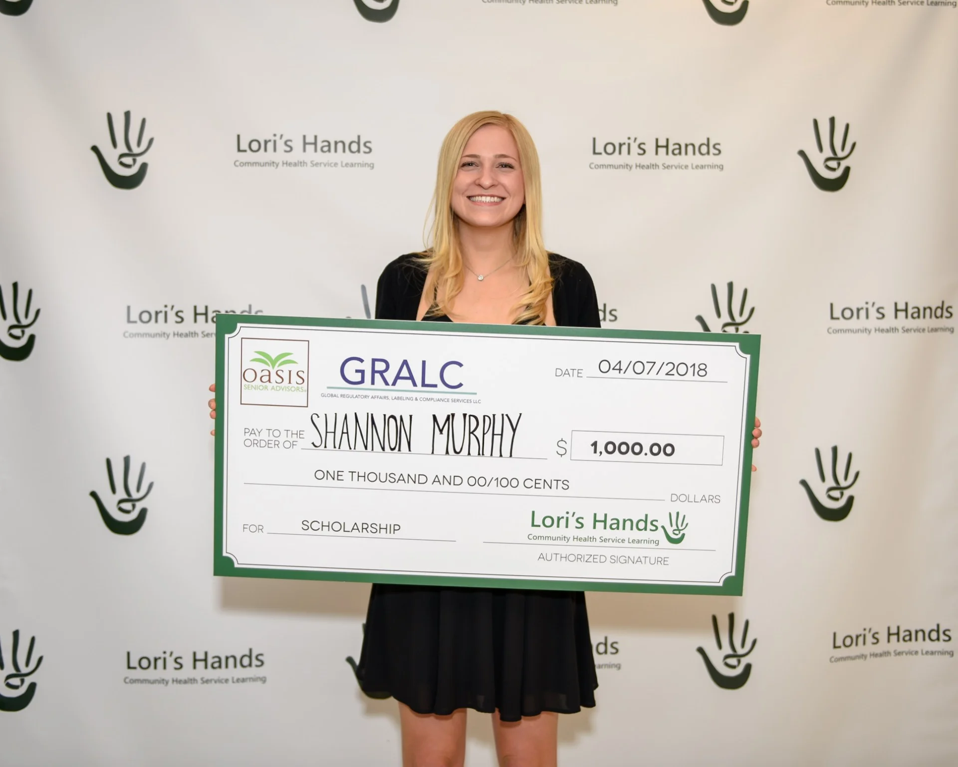 Shannon accepts her scholarship at the Green Ribbon Gala!