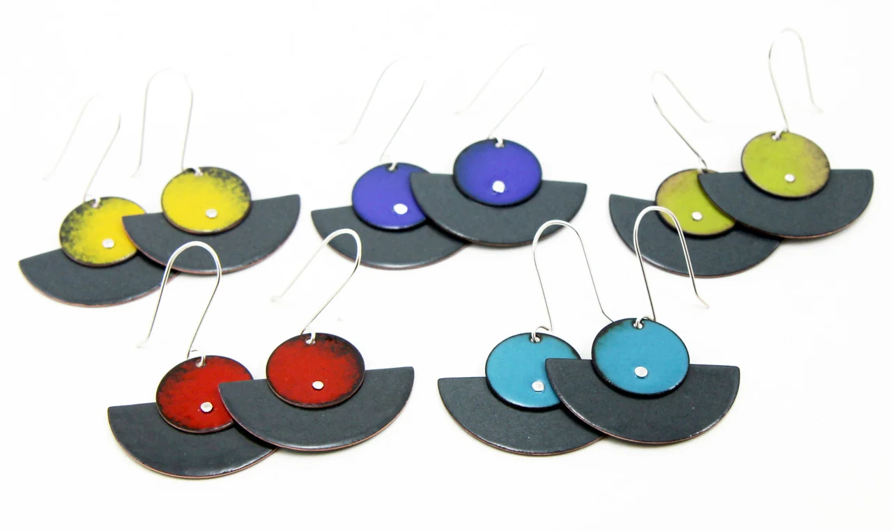 I’m happy to announce that I’ll be participating in the FUSION: COLLISION / INTEGRATION show at the ACCI Gallery in Berkeley. Starting next Monday, I’ll have these five pairs of fan enamel earrings on sale beside the artwork of several jewelry artists from the Metal Arts Guild (which I’m a member of) and Northern California Enamel Guild .
The show is running from October 19th - November 24th and if you stop by on Monday, November 3rd between 2pm and 6pm, I’ll be at the gallery to show you them in person. Come on by and say hi!
There’s also an opening night party on Friday, October 24th from 6 - 9pm that’s sure to be fun. But sadly, I’ll be out of town for this. I’m heading up to Walla Walla, Washington to visit my little sister - yay!
FUSION: COLLISION / INTEGRATION WHEN: October 19th - November 21st Mon-Sat 11am-6pm; Sun 12pm-5pm LOCATION: ACCI Gallery @ 1625 Shattuck Avenue, Berkeley, CA, 94709