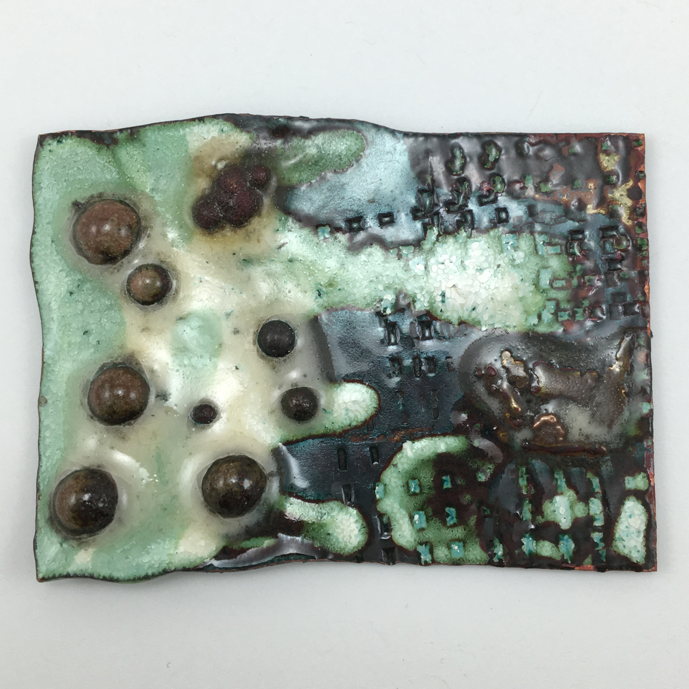Exploring copper balls in white liquid enamel.