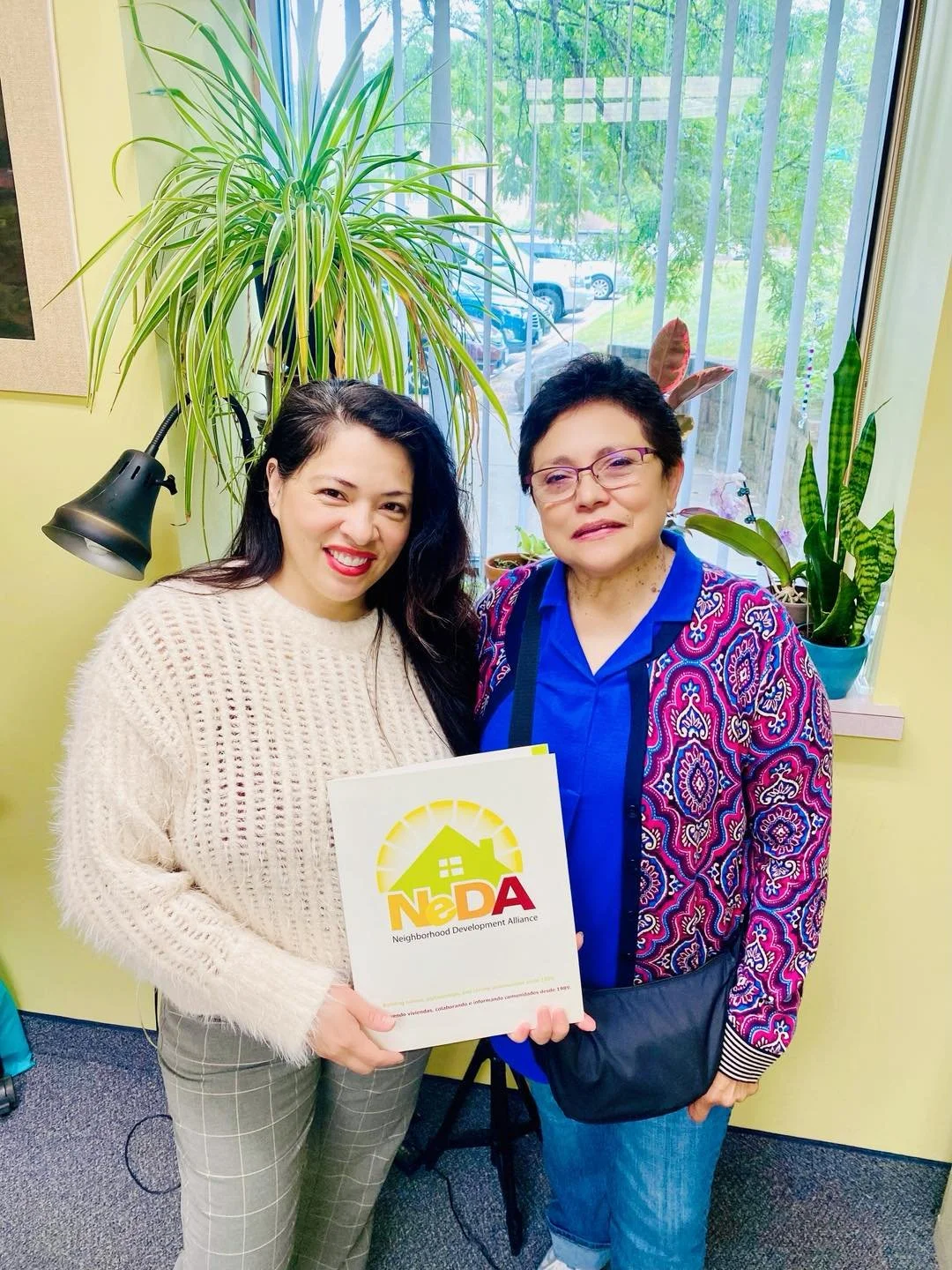 NeDA_Alma with Client successfully signing a Fix-up Loan.jpg