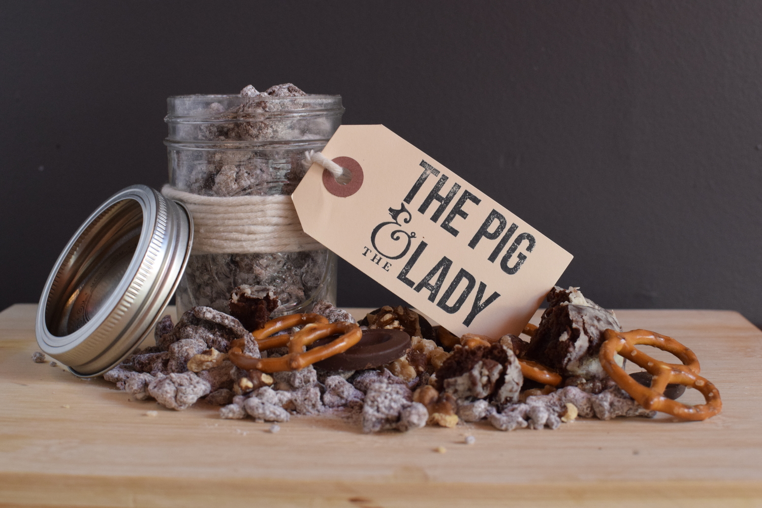 HOLIDAY PIGGY POOP -- valrhona chocolate covered bits of bacon fat waffle cone, salted pretzels, toasted walnuts, dried currants, mini marshmallows, valrhona crinkle cookies and maldon salt tossed in coconut powered sugar