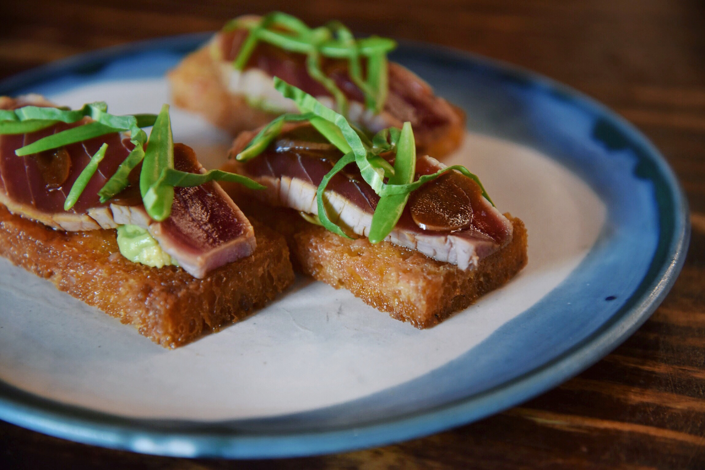 Ahi Tataki on Spanish Toast, J.P.R’S SHOYU GARLIC, SMASHED TOMATO, AVOCADO, ESPELETTE PEPPER