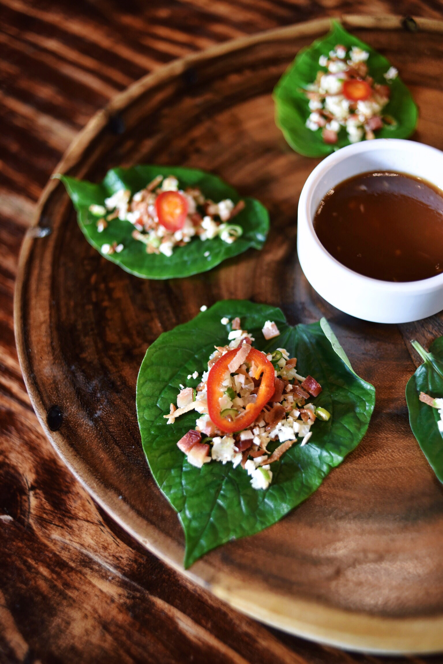 YOUNG BETEL LEAVES, CALAMANSI, COCONUT, GINGER, THAI CHILI, SMOKED MARLIN, TAMARIND