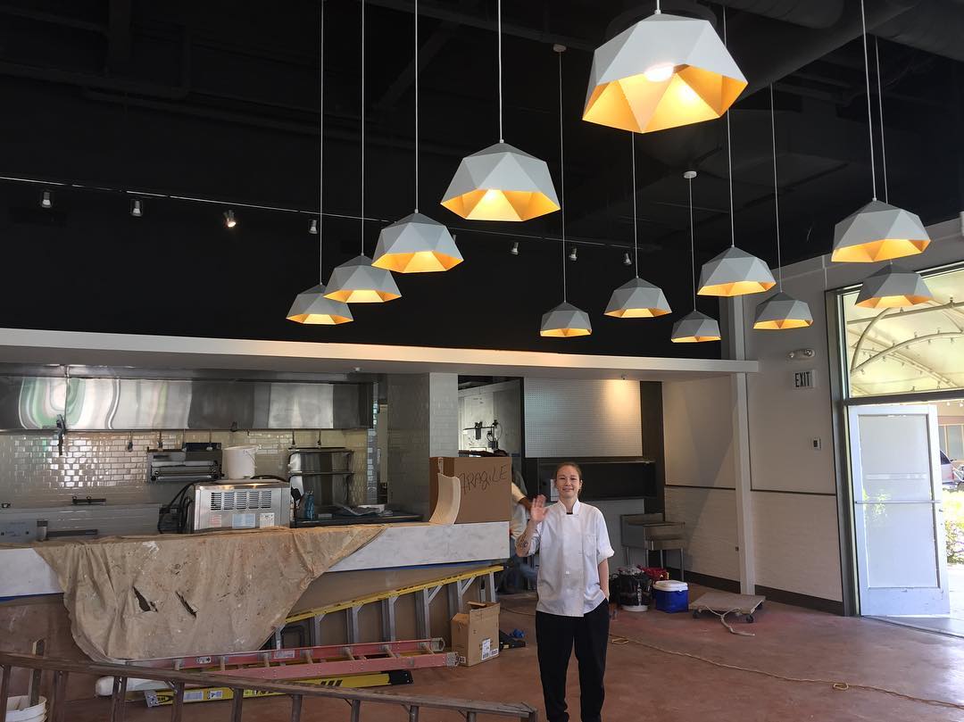 Sous chef Jade inside the work-in-progress Piggy Smalls space at Ward Village. 