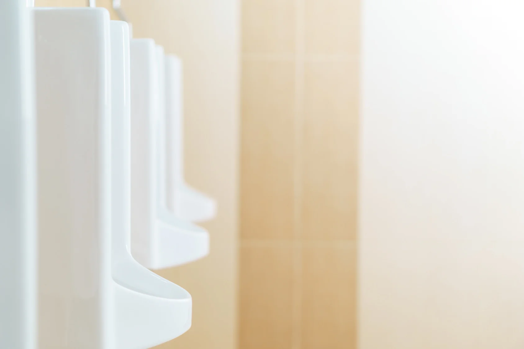 Fotolia_26750683_Urinalsonwallfade.jpg
