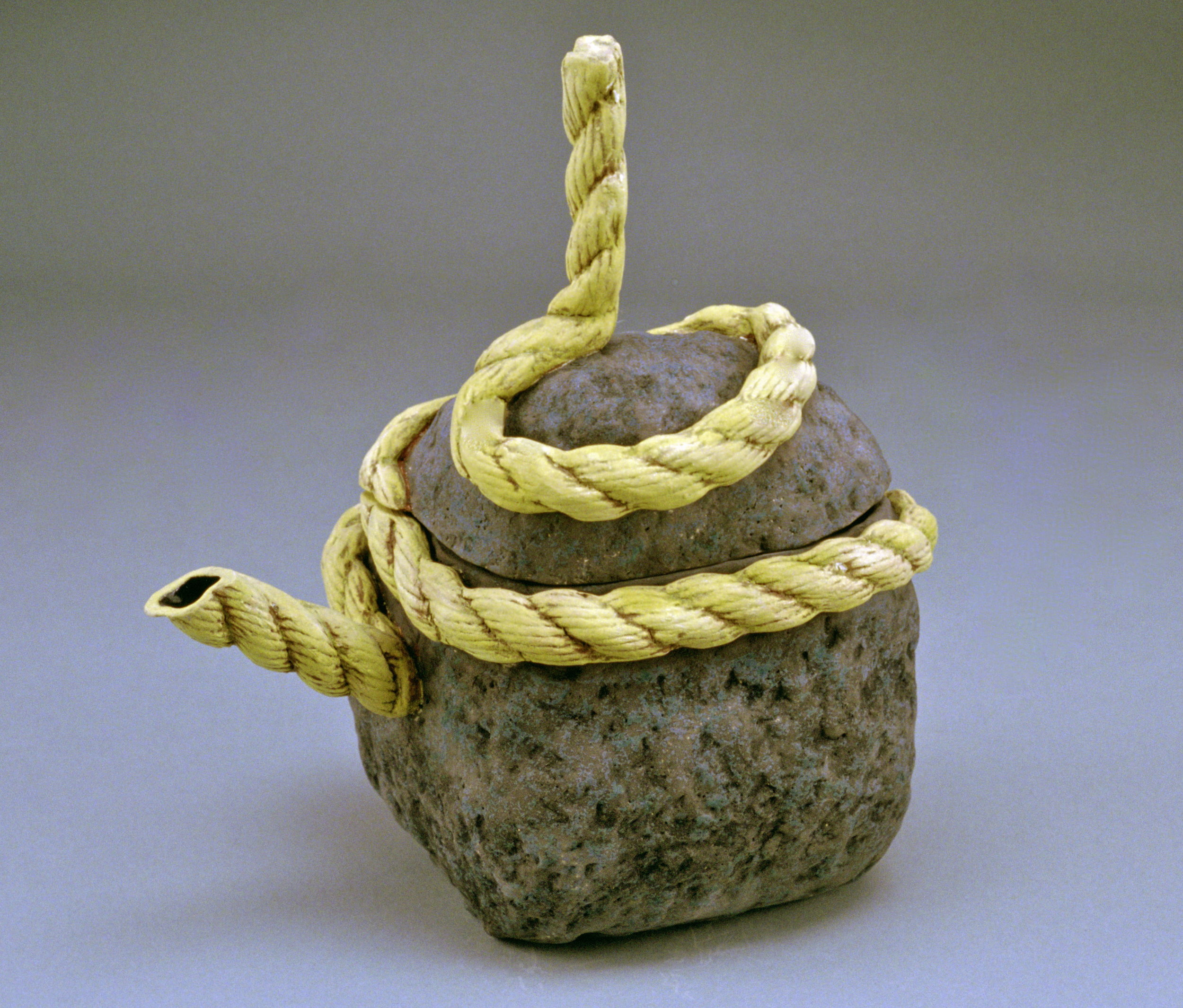   Ancient Tie II , 1991 Earthenware, glaze, gold luster 9 x 8 x 6 inches 