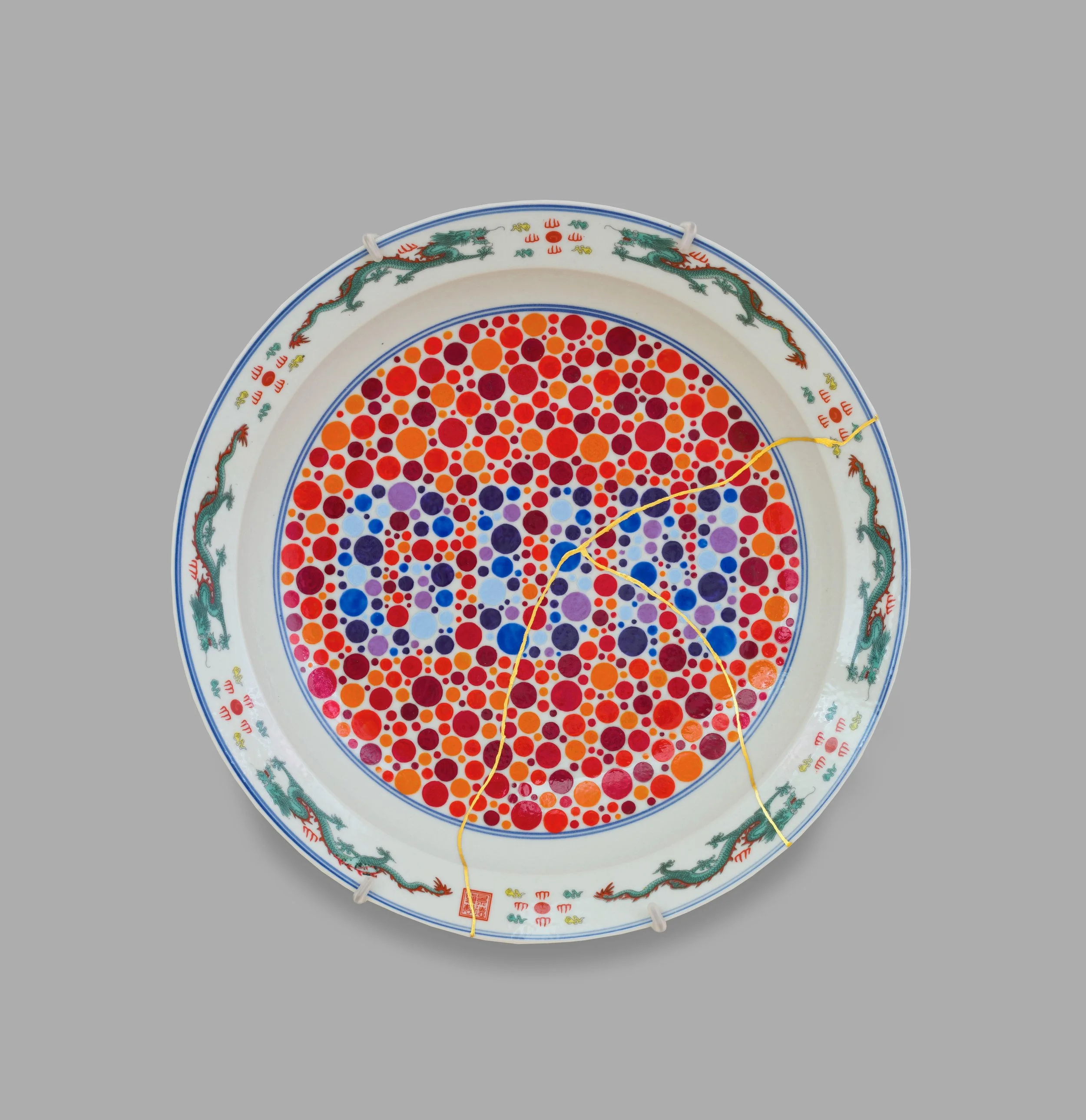   Perception Plate (GUN) , 2022 Porcelain, glaze, china paint, decal 17 x 17 x 2.5 inches    