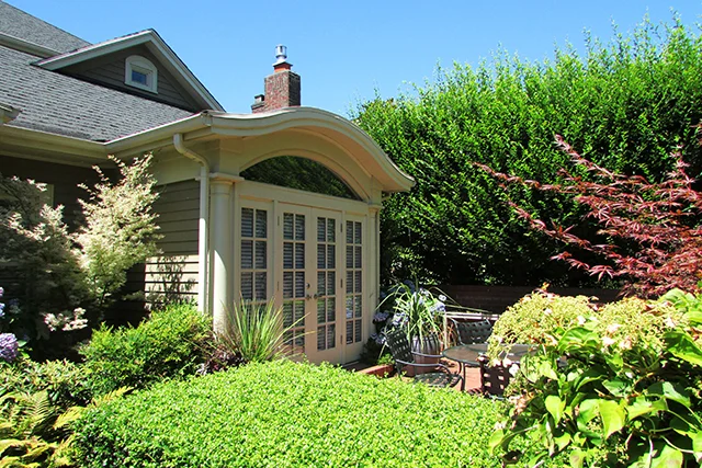 Here is a photo of the existing front showing the unique architecture