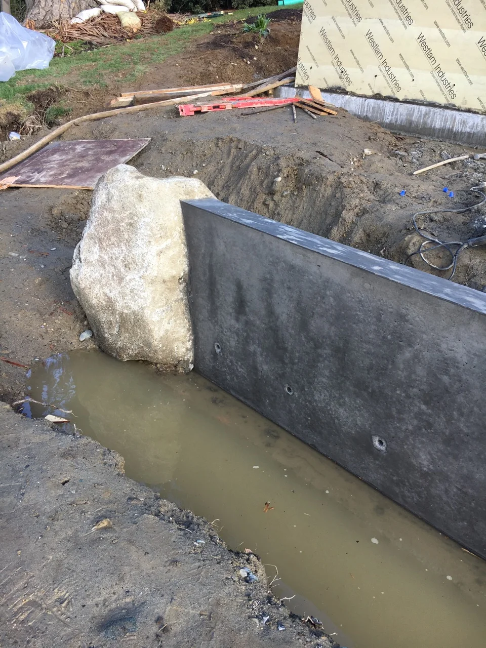 Great craftsmanship for a wall terminus - no gaps between wall and boulder!