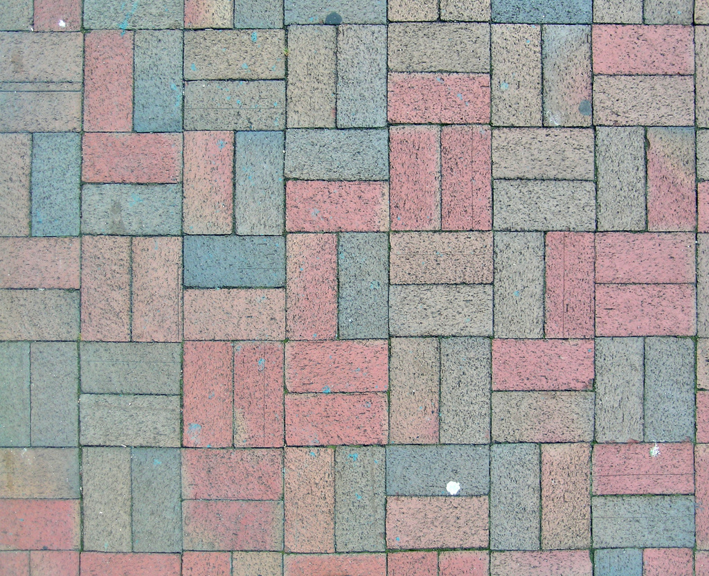 Multiple colors create a playful basket weave pattern.