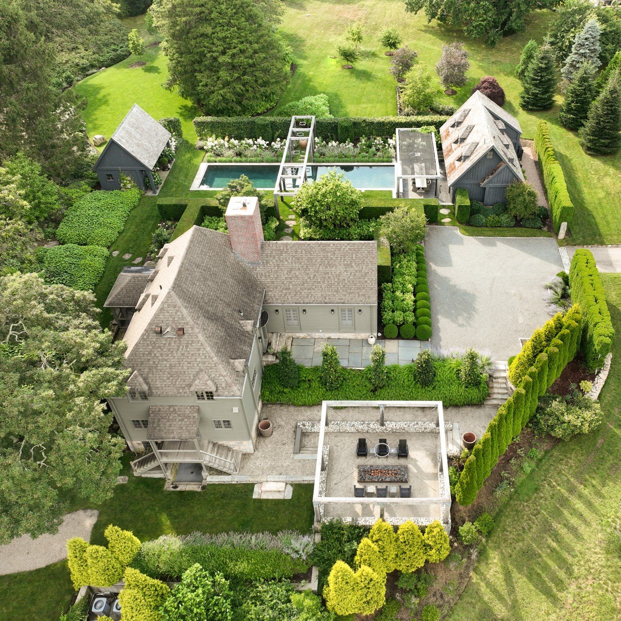 We love plants &mdash;but structure is what makes a garden sing.

At The Studio in Rhode Island, sculptural white oak arbors do the heavy lifting: framing the fire feature terrace, defining the dining terrace of the guest house, and making a bold cro