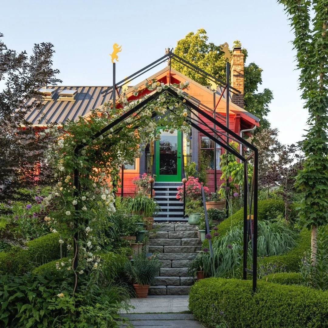 A series of entry arbors greet all guests to Land Morphology's founding partner Richard Hartlage's home and garden.  The tallest arbor honors the beloved schnauzer trio of Pluto, Jupiter, and Nova, and does not forget the late Astro.  Diamond plate s