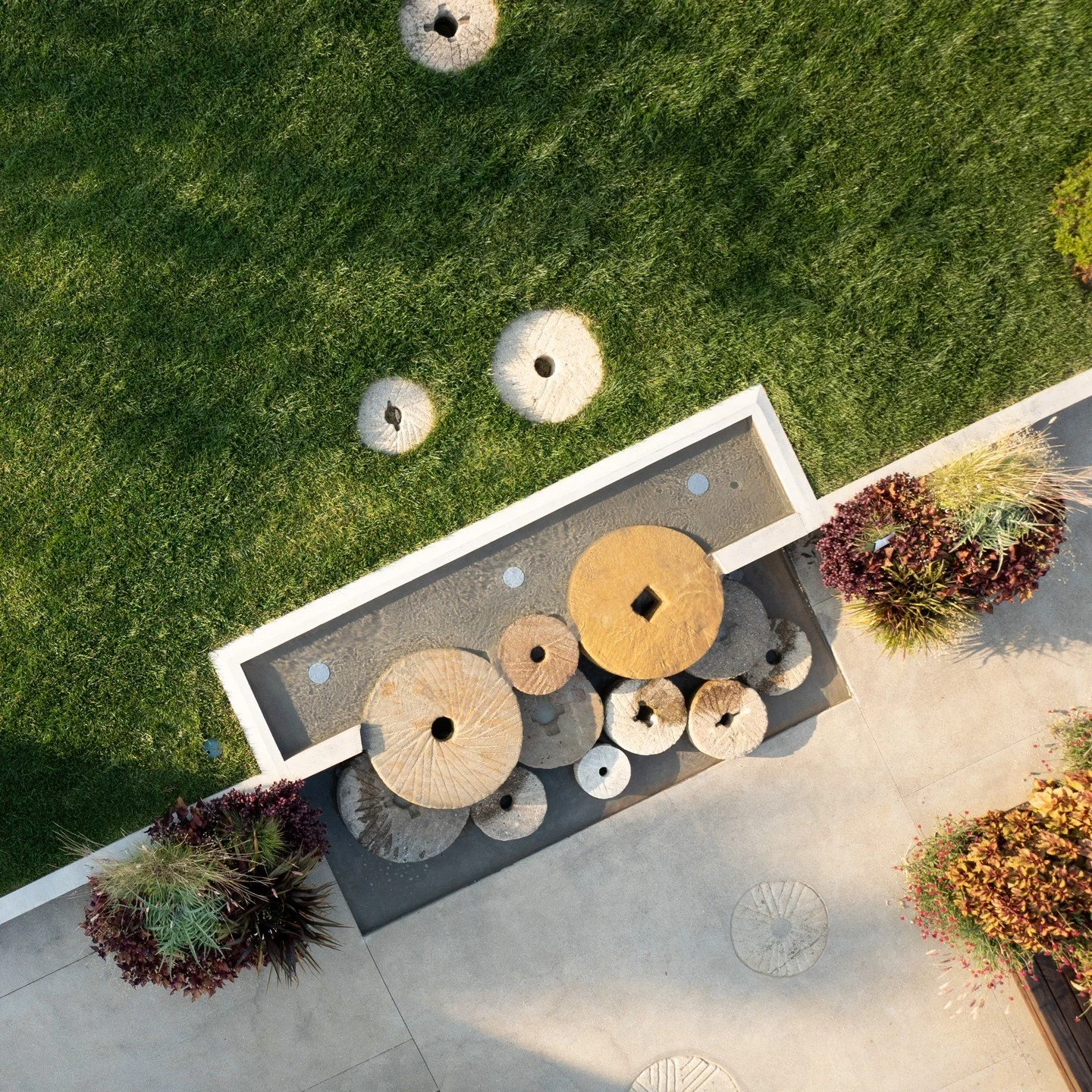 Historic millstones collected by the garden&rsquo;s founder anchor a new water feature in Yell Dell Botanical Gardens&rsquo; Castle Gardens. Designed by @LandMorphology, the feature creates a focal point for the garden&rsquo;s new event and display g
