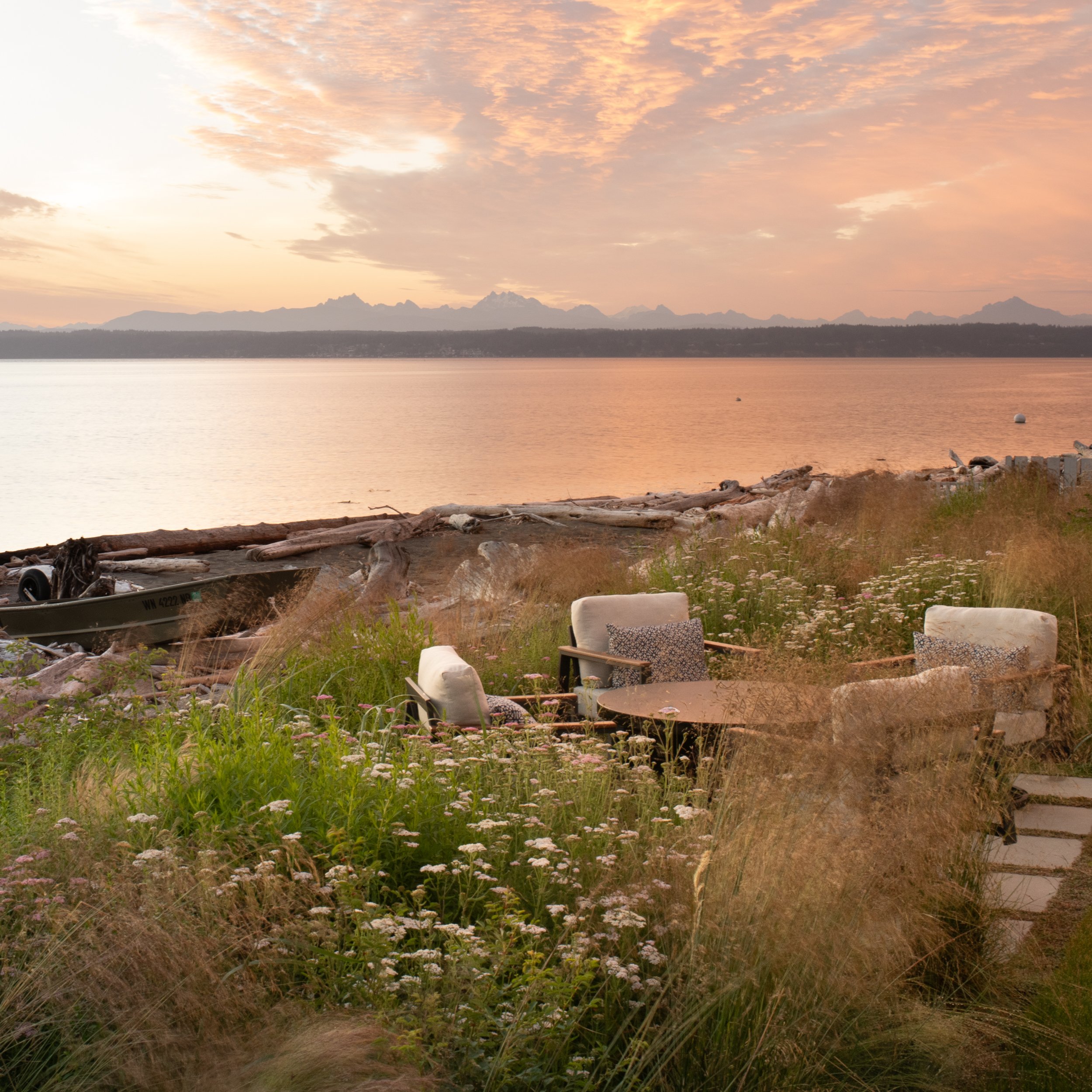 An area for sitting shoreside includes   Common Yarrow, Douglas Aster, Tufted Hair Grass and American Dunegrass.