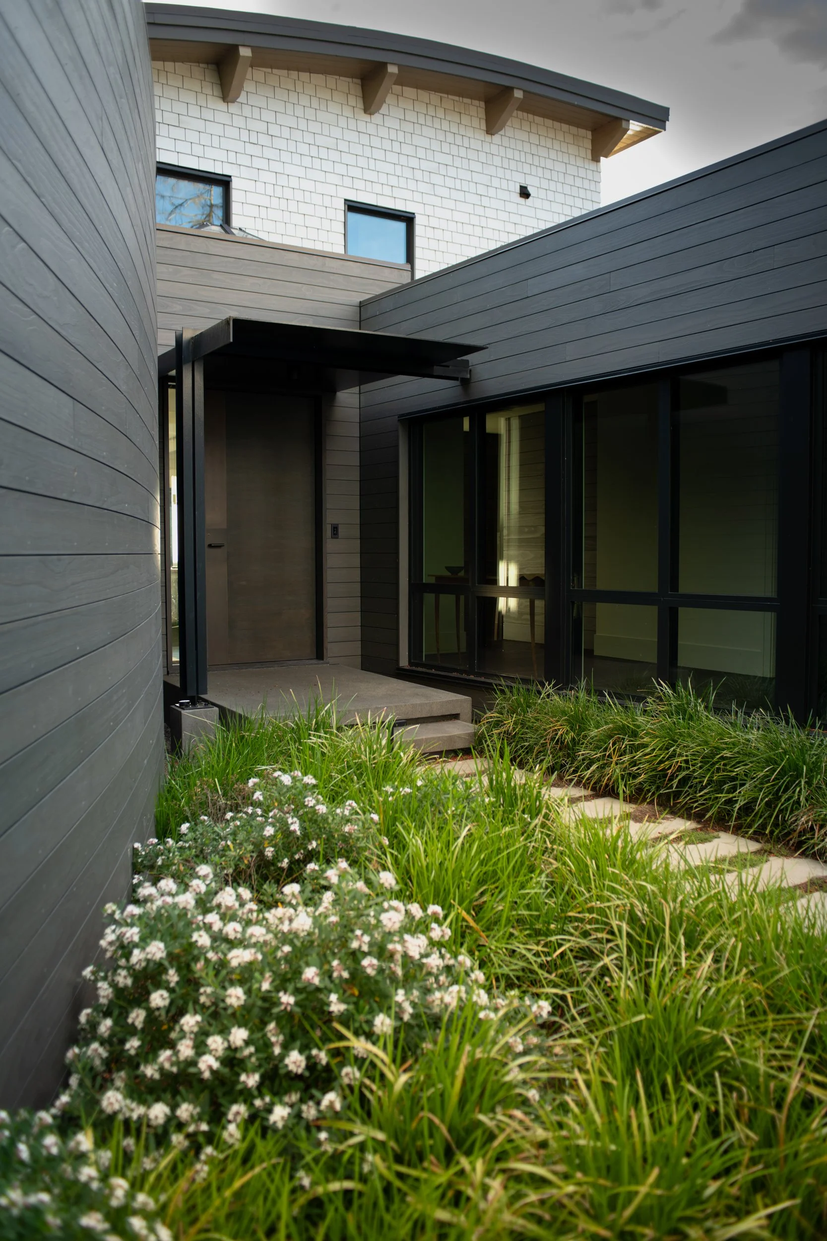 Entry walk to front door with planted area