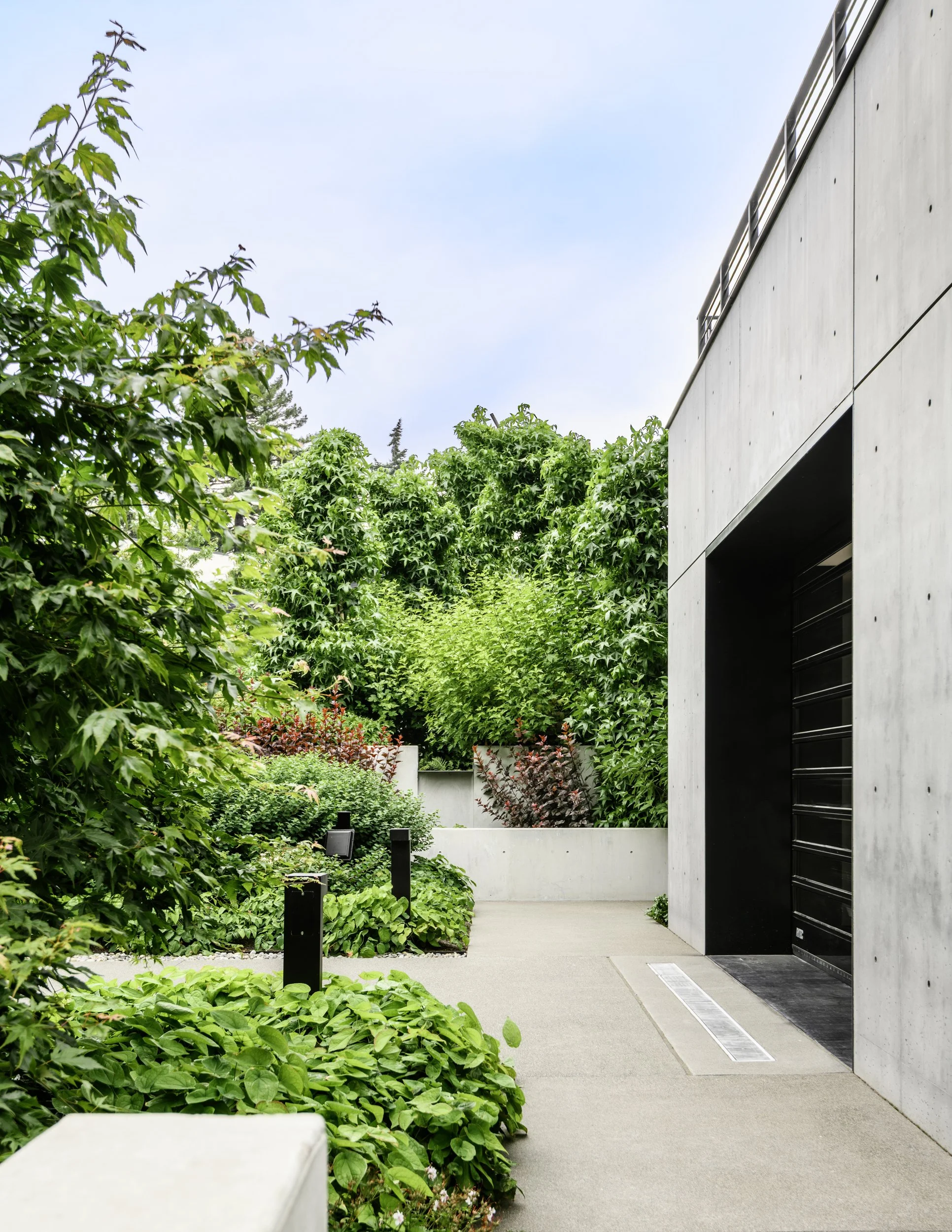 View of bio retention and garage door.