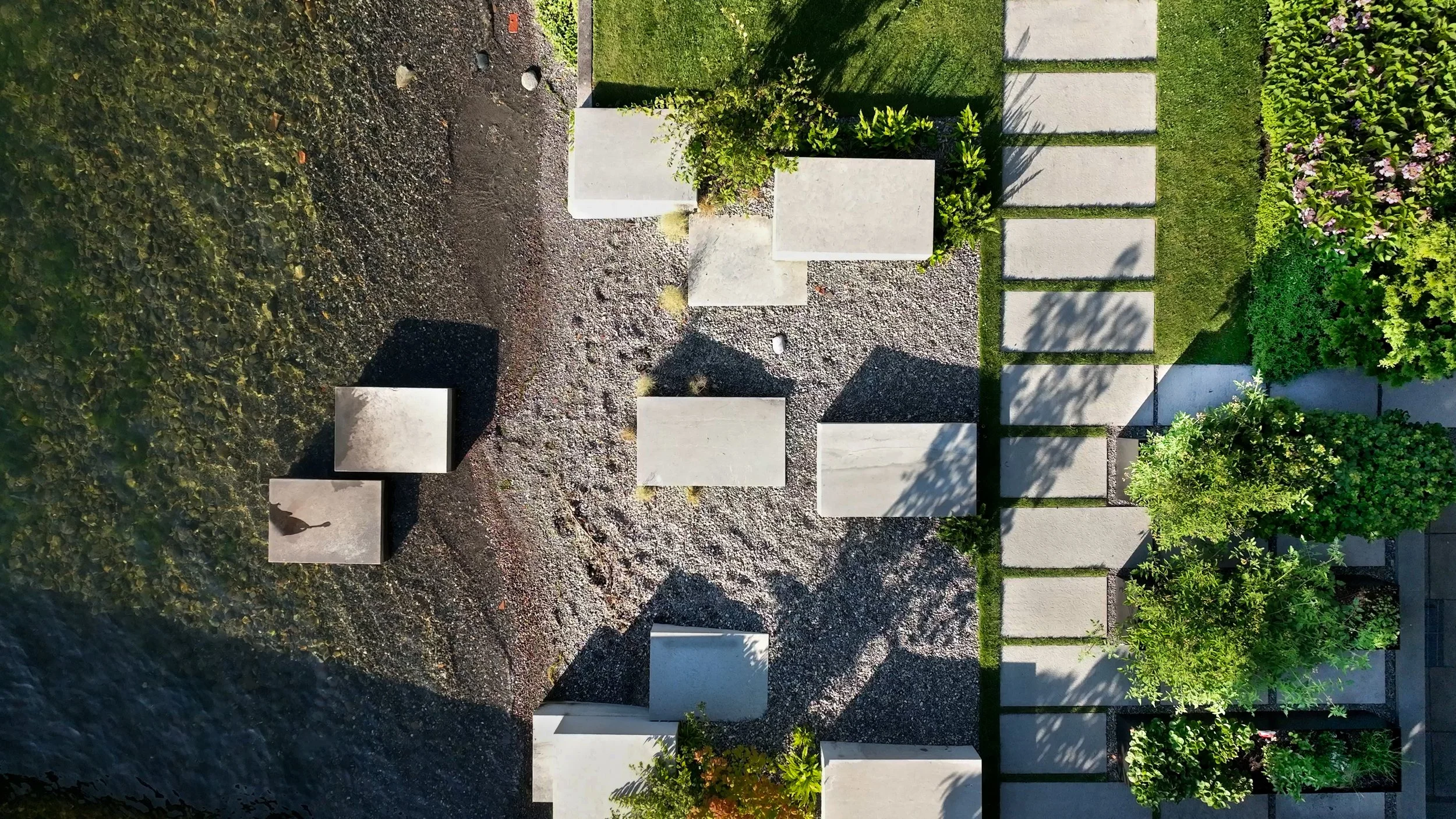 At Shore Blocks honed stones placed on the beach and in the water attenuate wave action at different water levels and provide spaces for lounging and playing at the water’s edge.