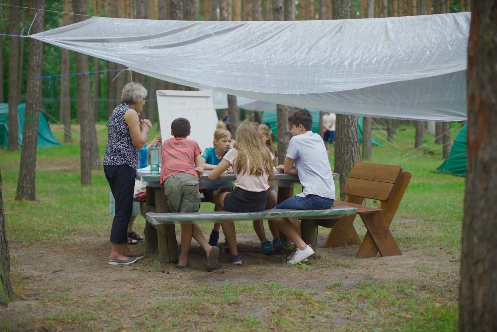 Bev teaching her class outside under one of the new rain shelters