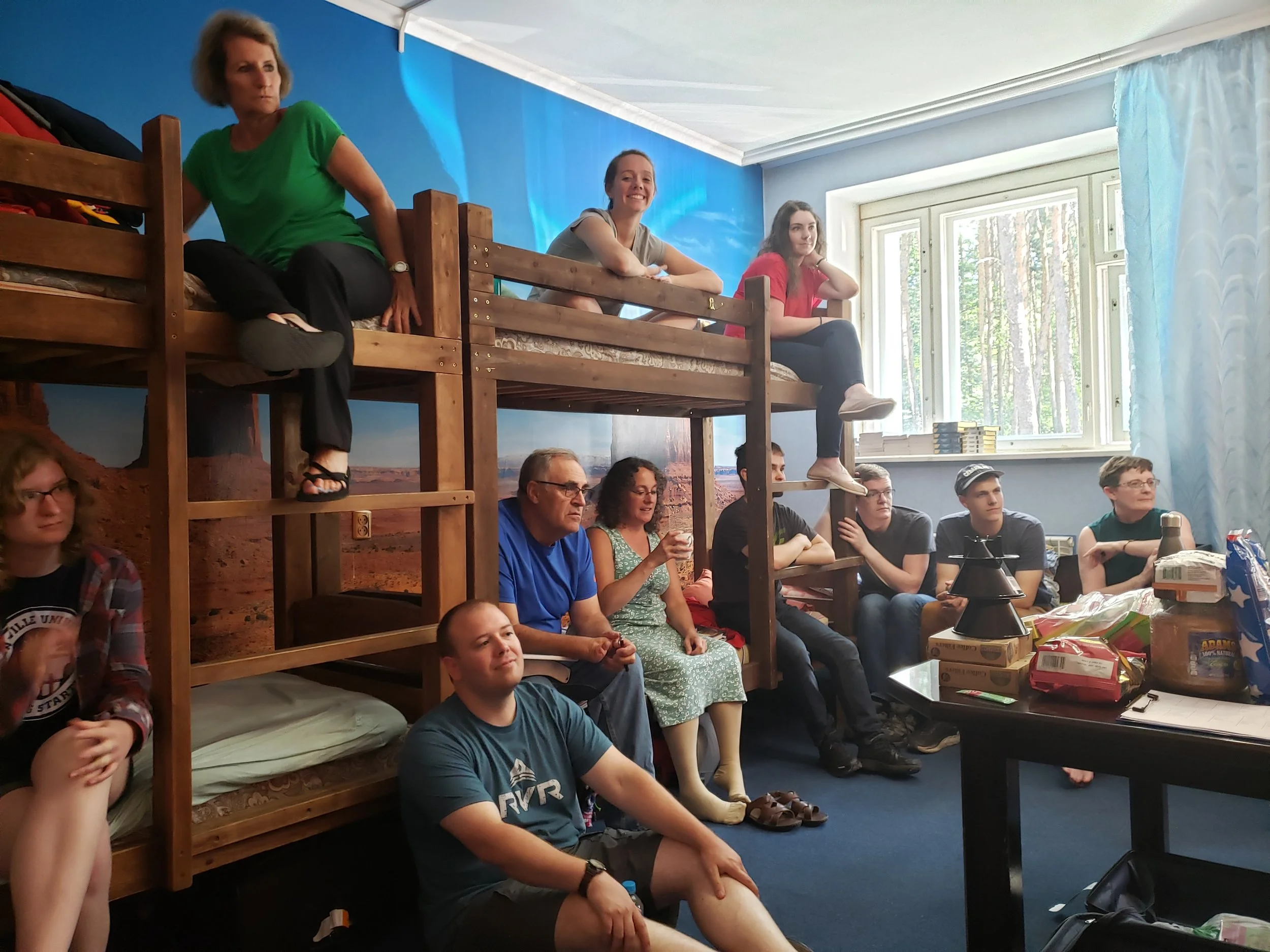 Gathered around for our first team meeting before the campers began to arrive.
