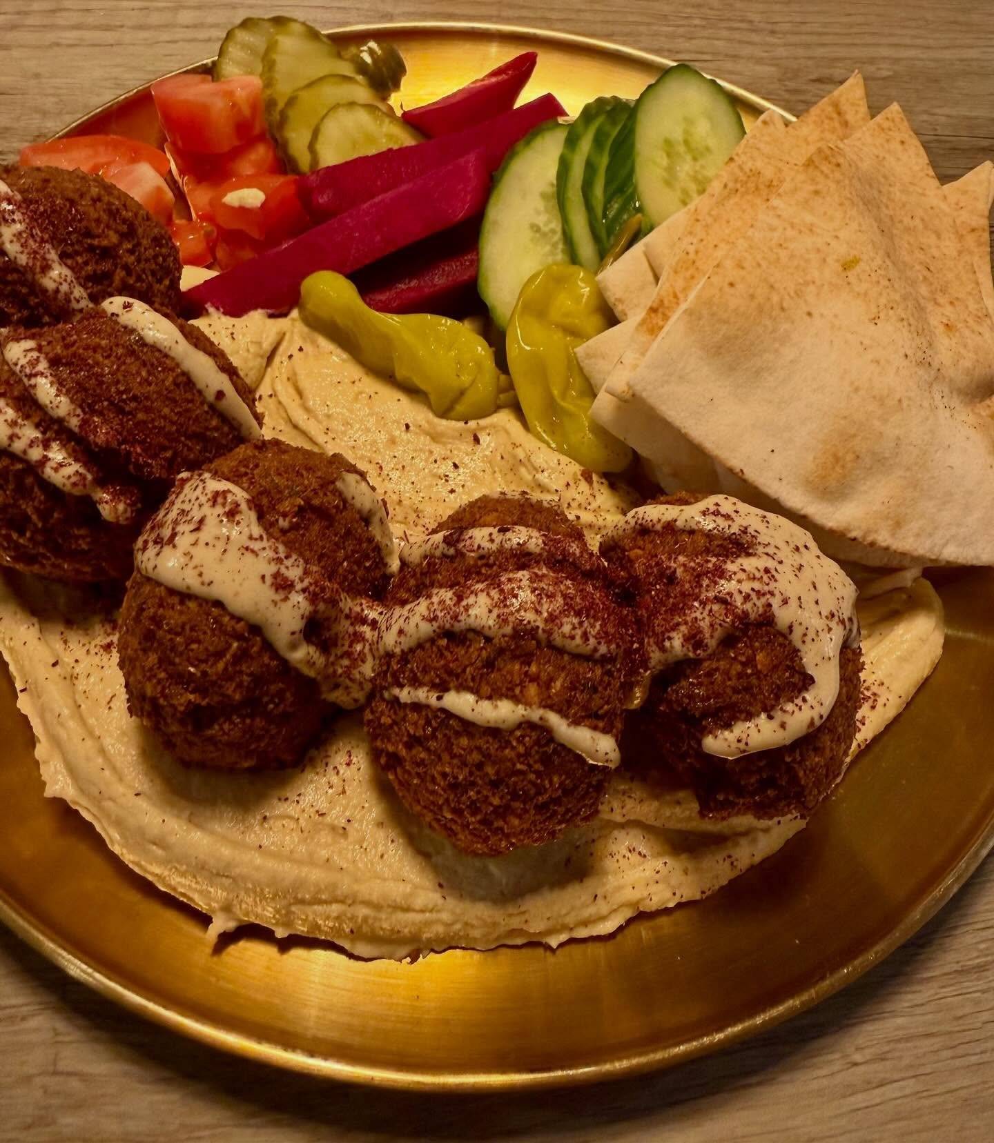 Tried @tahini.gvl for the fist time last week and was blown away. I had the not-so-traditional chicken wrap with zataar fries. 🤤 The falafel might have been the star of the show though, it was a fantastic dish. 

Delicious food at reasonable prices 