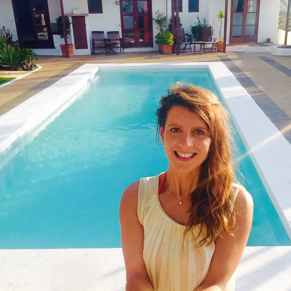 Lydia - Owns and is totally in love with Oasis Surf House