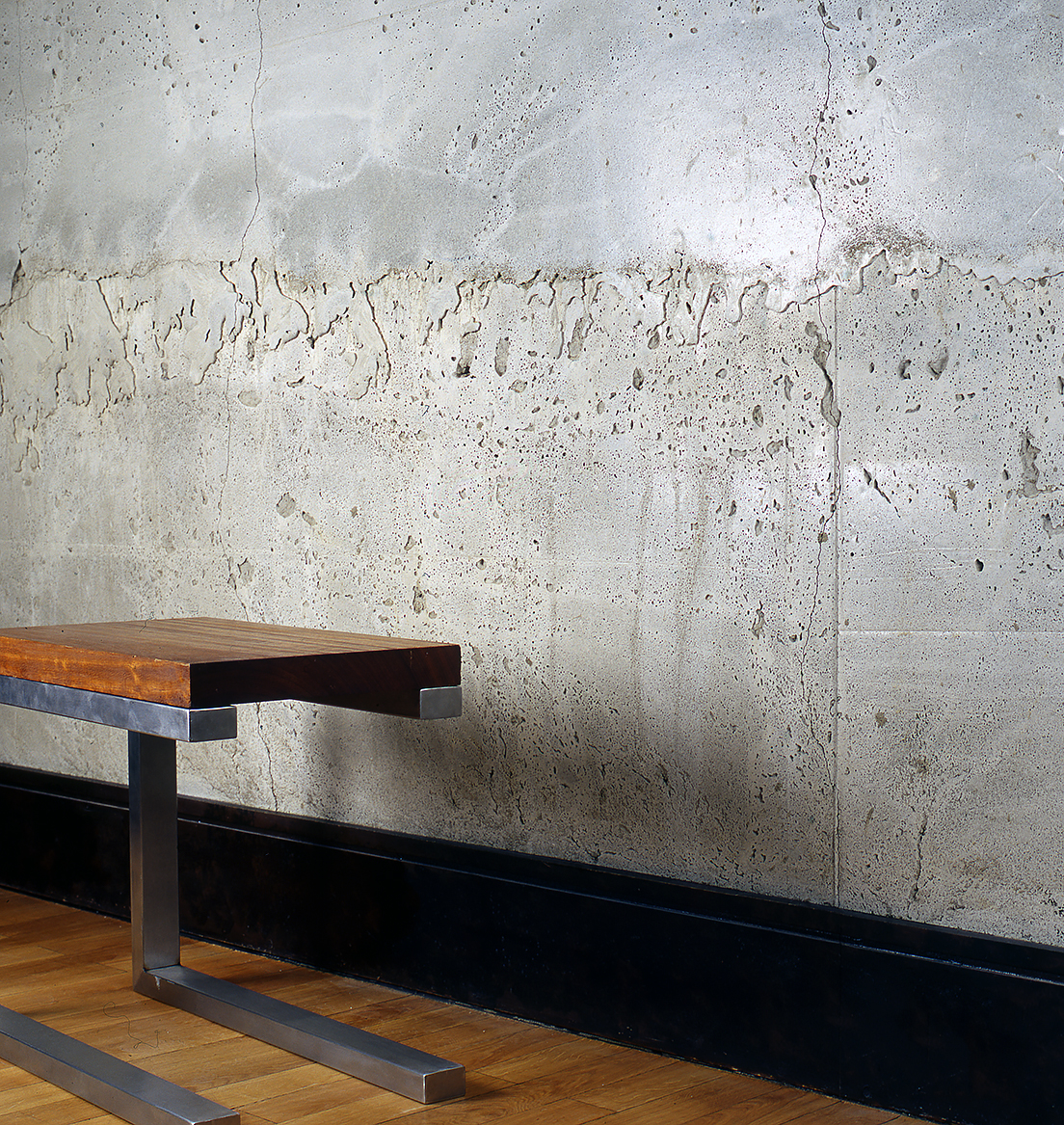 Chair: Eroko and Stainless Steel: Polished Concrete Wall